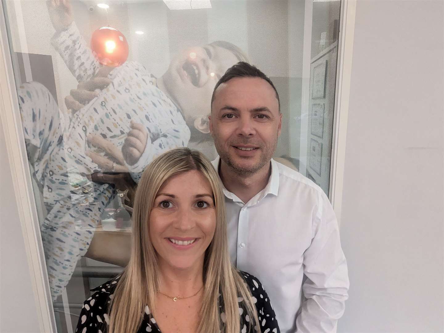 Carly French (front) with husband Lee (back).
