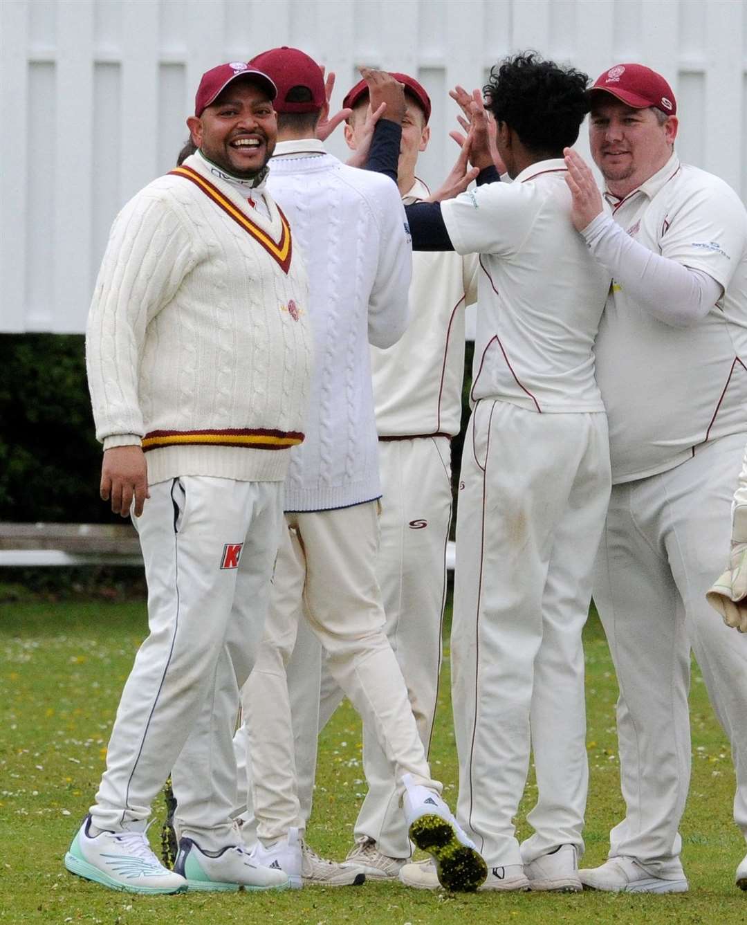 Moulton Harrox 2nds celebrate a wicket on Saturday. Photo: Chris Lowndes