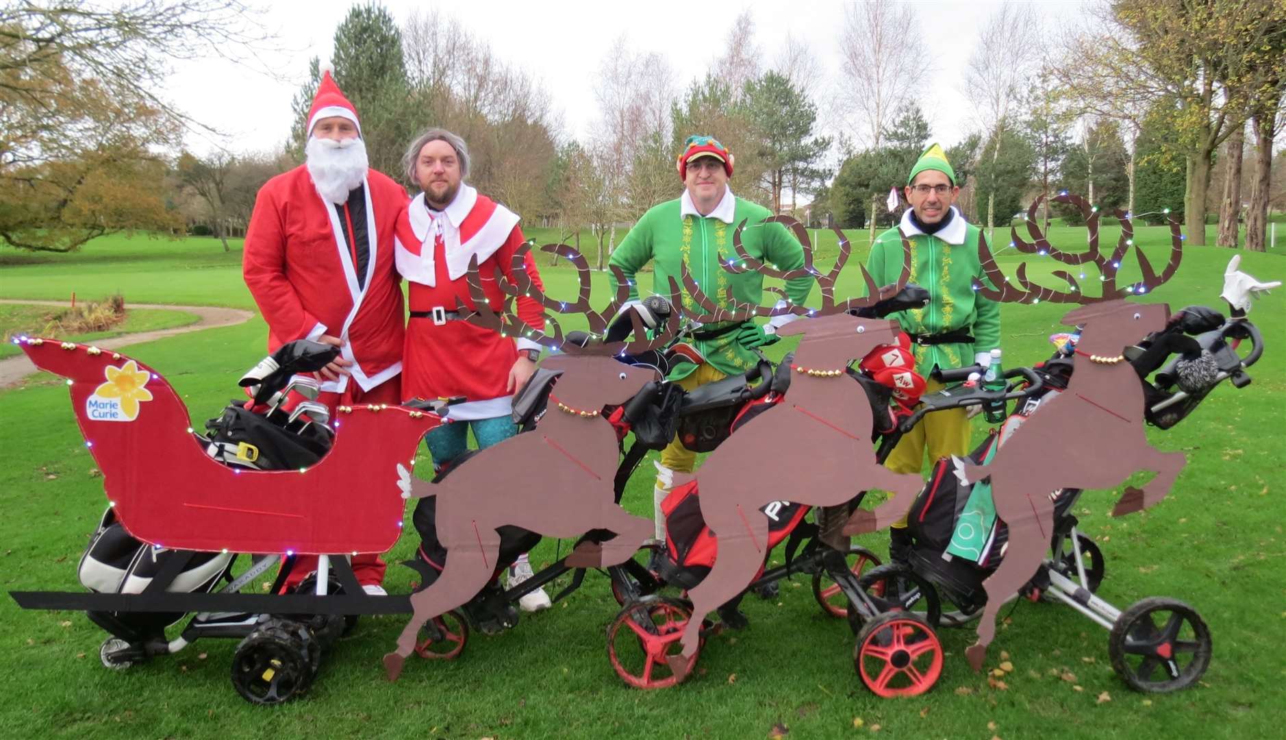 Santas, Dan Blankley and Luke Harley, with Elves, Ian Barnes and Pedro Morais.