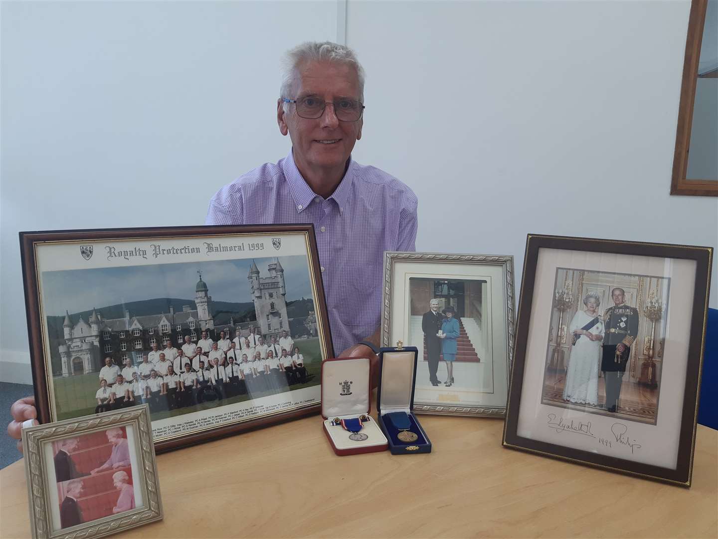 Paul Gillender, who now lives in Baston, with some of the memorabilia from his days as a royal protection officer