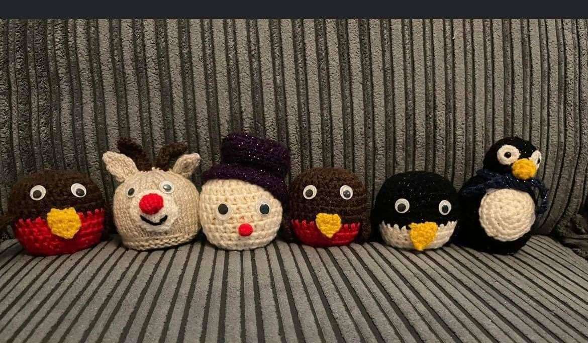 Some of the covers created by the BHive Community Hub Knit and Natter group.