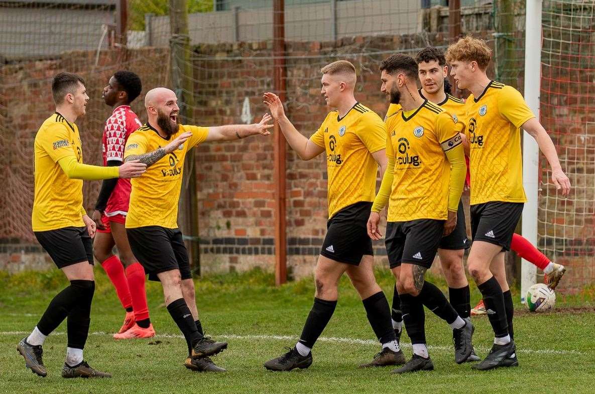 Harrowby players congratulate goalscorer Taylor Gray. Photo: Steve Nesbitt @lincssnapper
