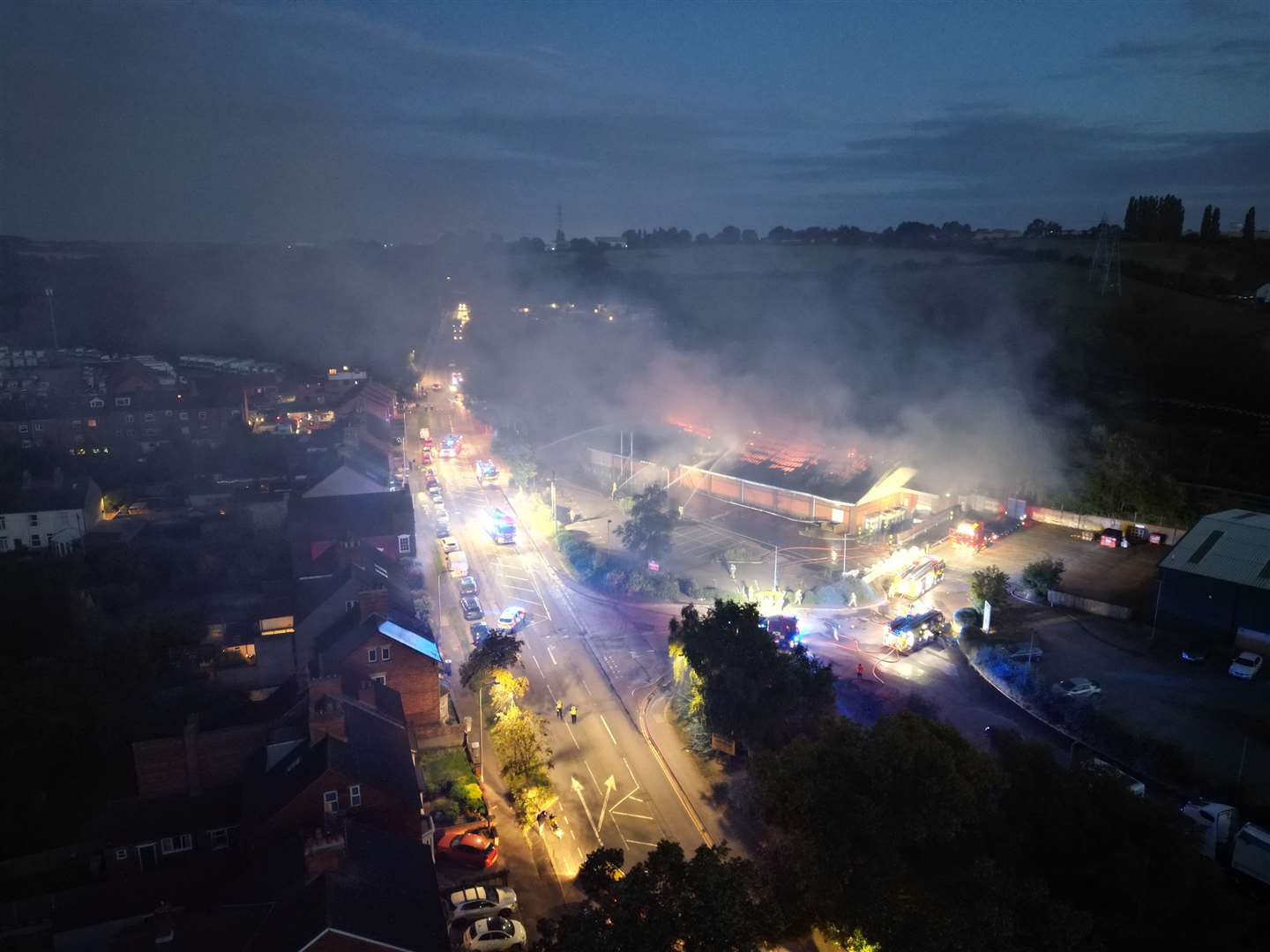 Drone photos show the extent of the fire at the former Aldi store. | Photo: Jake Harris