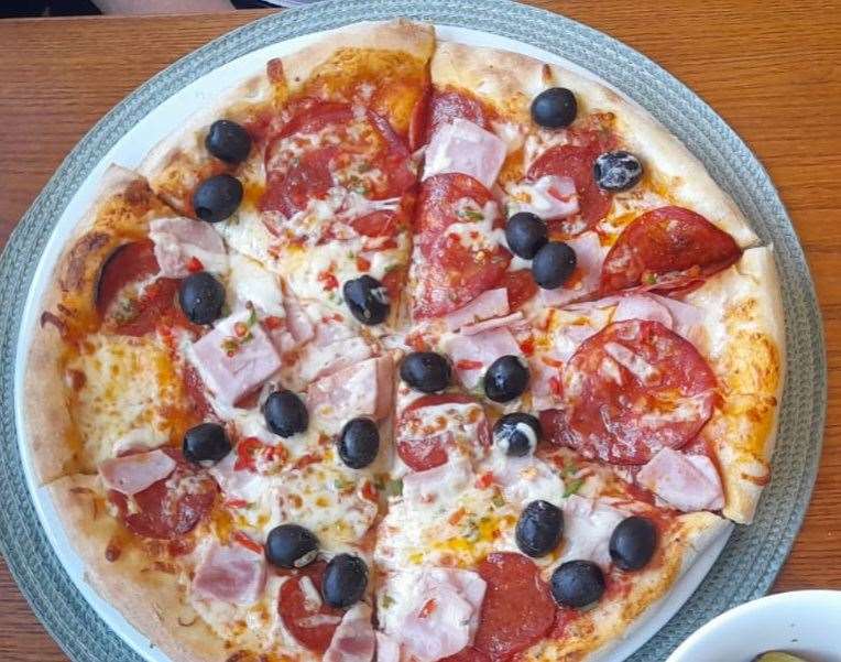 A pizza with two halves - Diavolina and the Giuliano Special with lots of olives