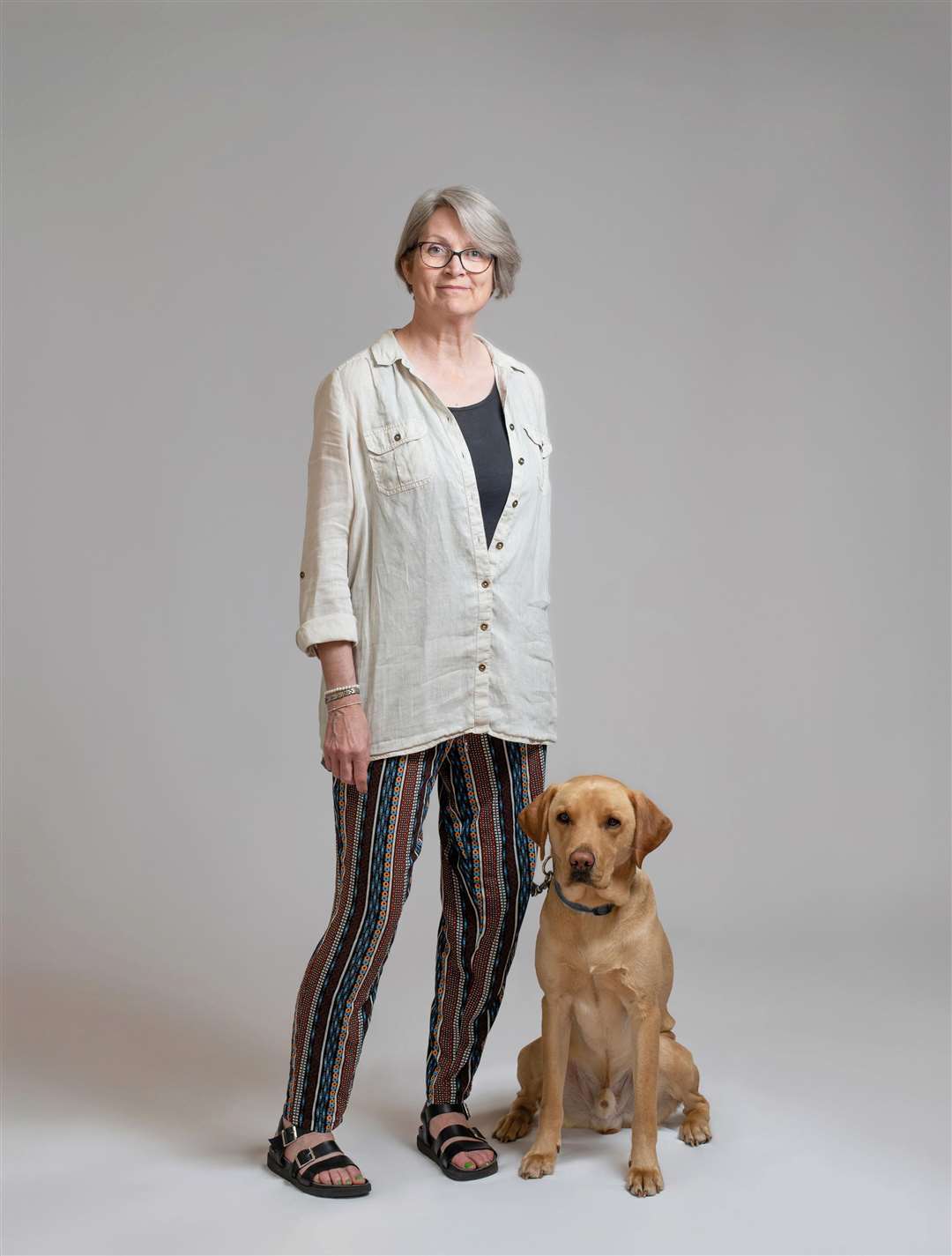 Member Jackie with her dog before their transformation. Photo: Fraser McGruer