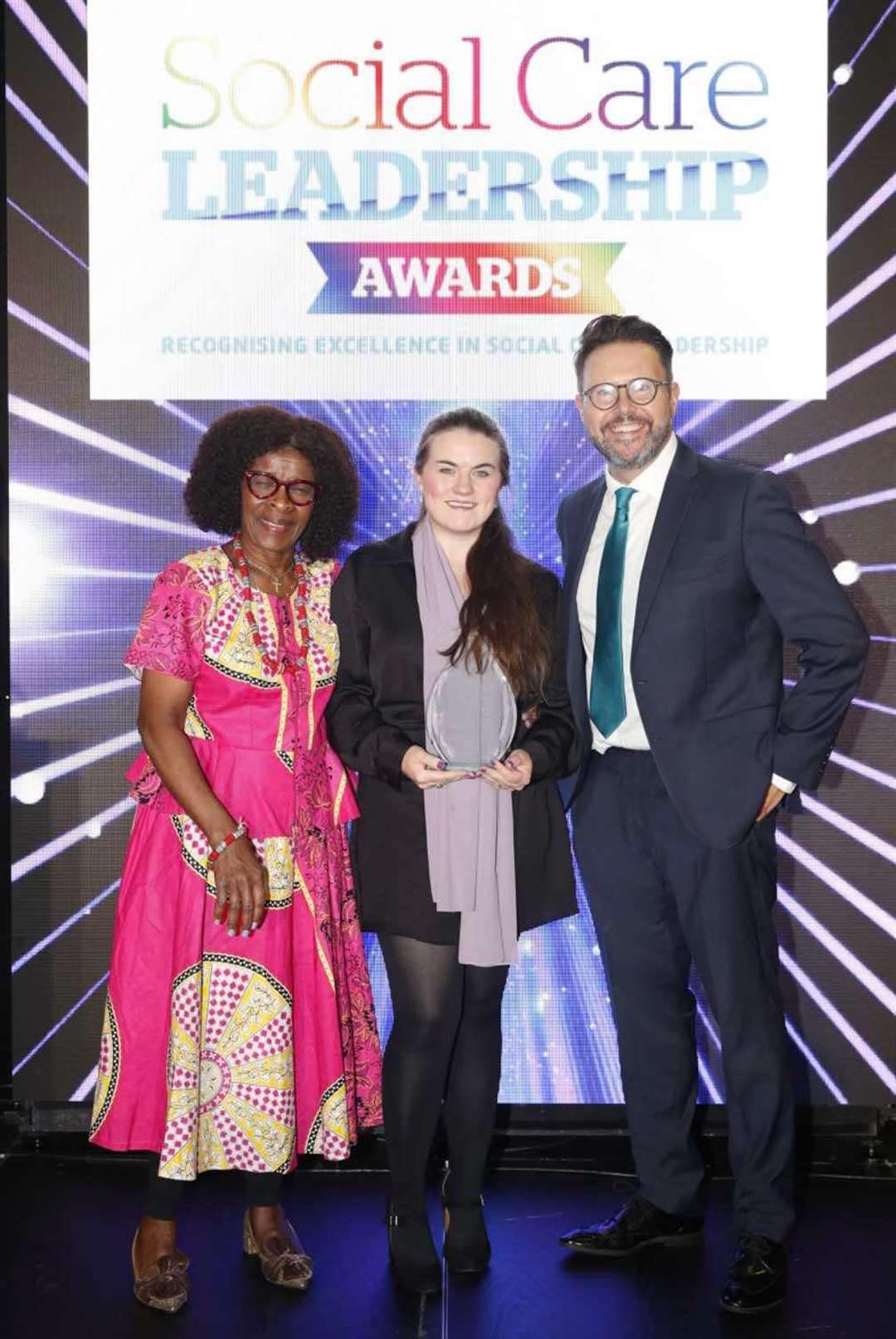 Lauren Mann (middle) receiving her award. Photo: Social Care Leadership Awards