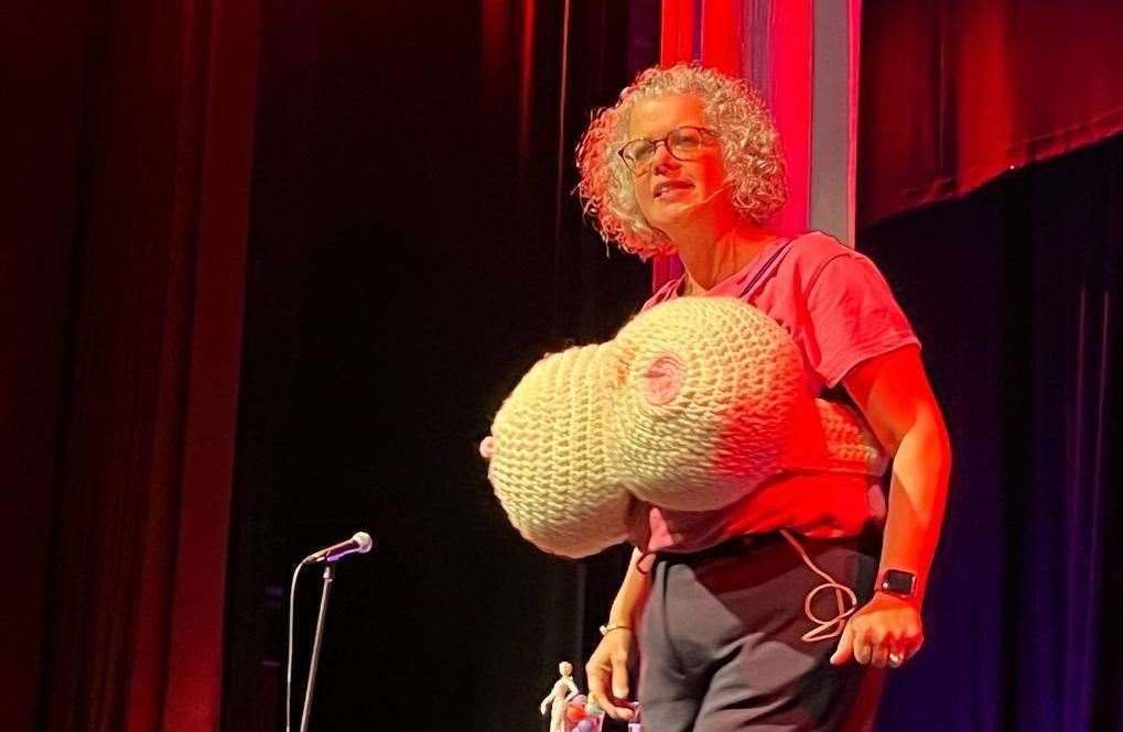 Zeph Churchill on stage at the South Holland Centre with her prop