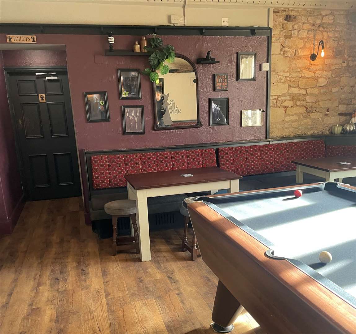 The artwork by the pool table appreciated the occult