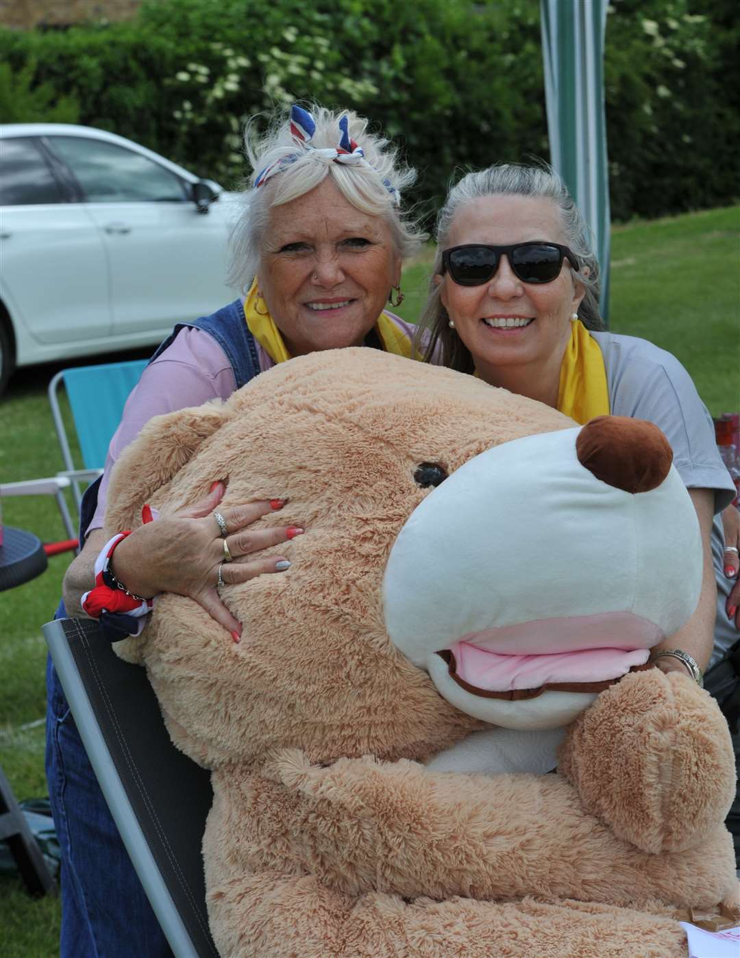 Jenny Spencer and Jan Culpinch from Holbeach Hospital Charity shop with 'Name the Teddy' stall at a previous Pinchbeck Carnival