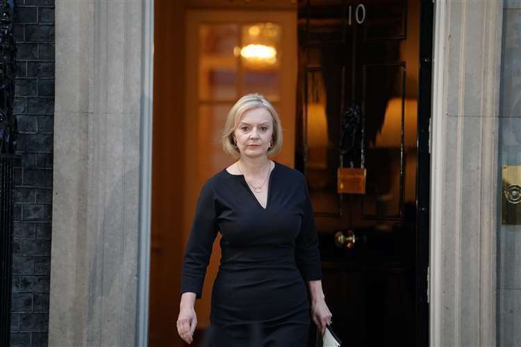Prime Minister Liz Truss walks from the door of 10 Downing Street, London, to read a statement following the announcement of the death of Queen Elizabeth II (Dominic Lipinski/PA) (59194048)