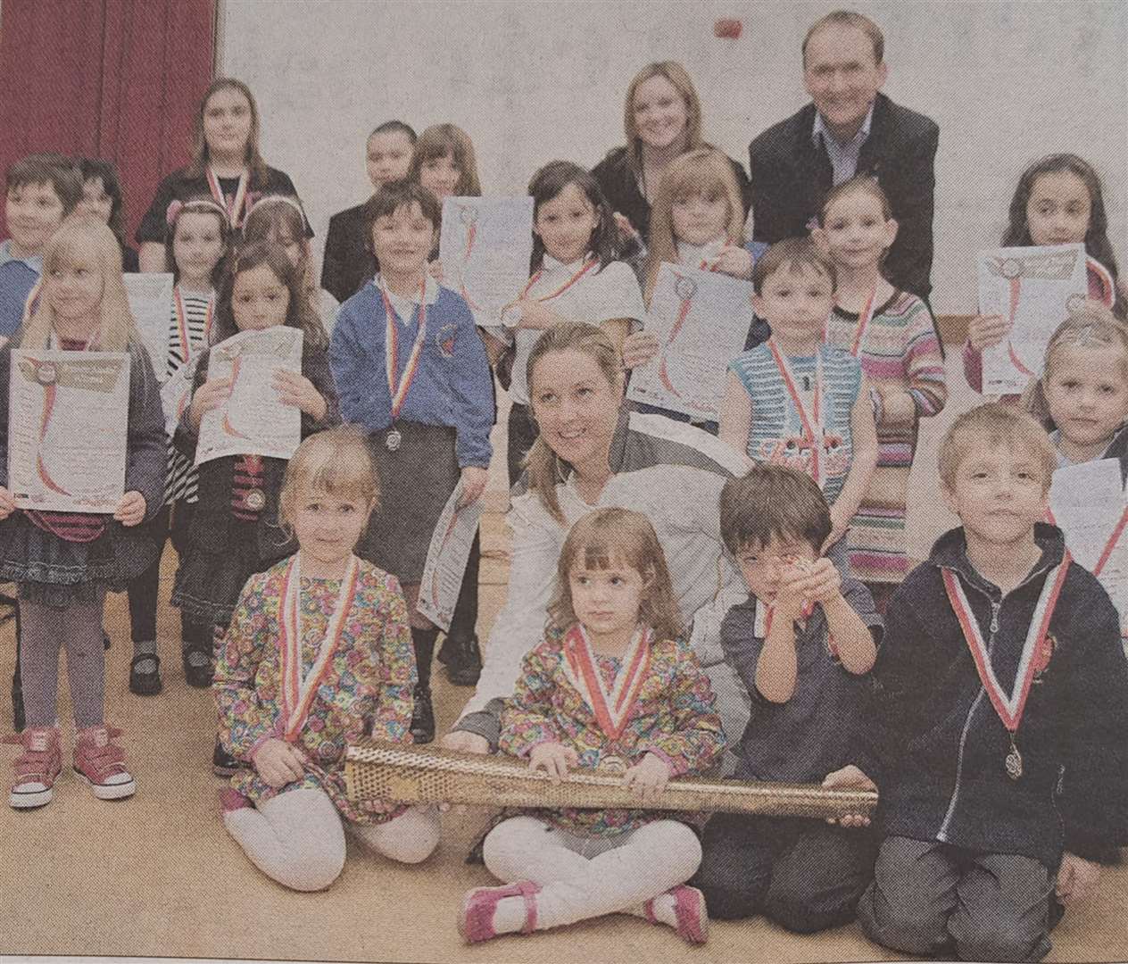 Youngsters receiving their medals 10 years ago