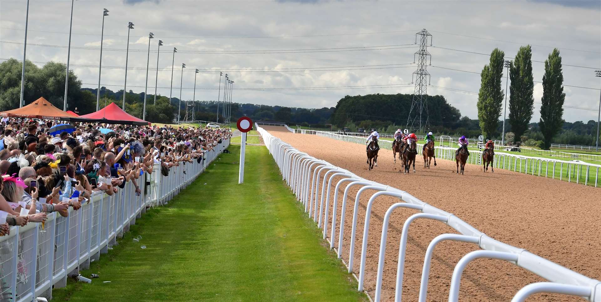 The racing action was a crowd pleaser, with many lucky bettors counting their winnings.