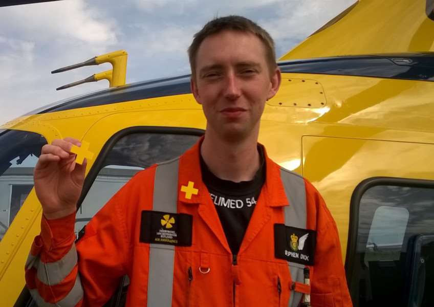 Critical care paramedic Steve Dick with one of the badges EMN-150924-105634001