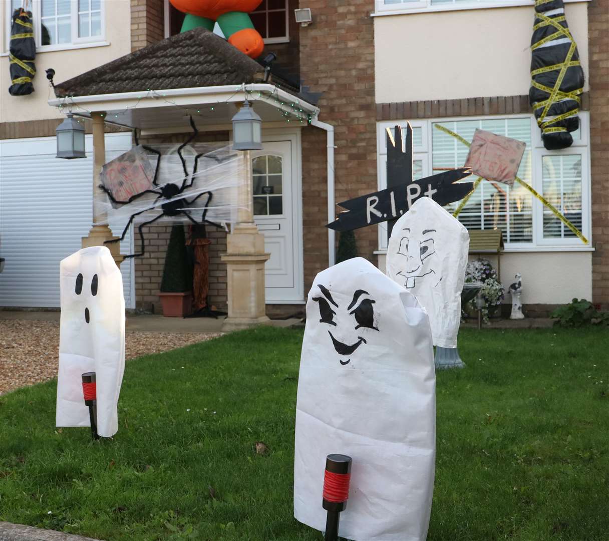 Gravestones watch as you enter