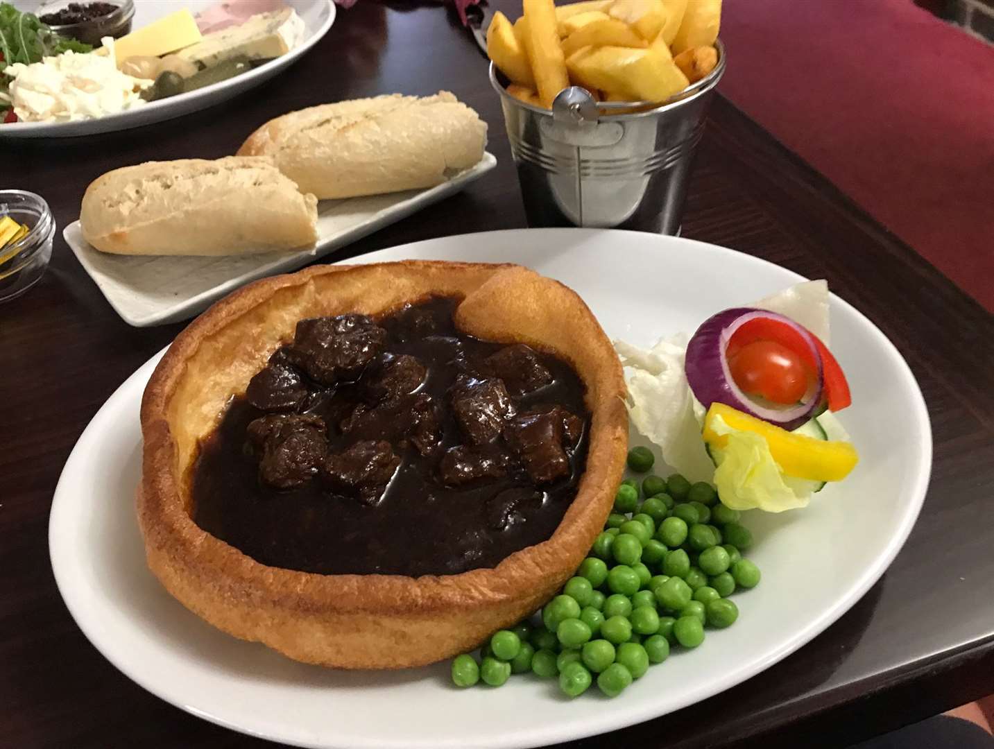 A main course of home-made steak and ale served in a Yorkshire pudding.