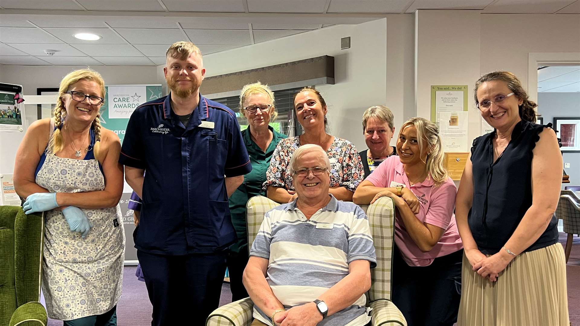 Mike Taylor (seated) will support other families in his role as relative ambassador at Wood Grange