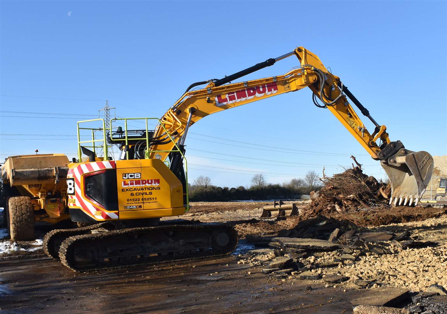 Builders on the new waste depot site. Photo: RSM Photography