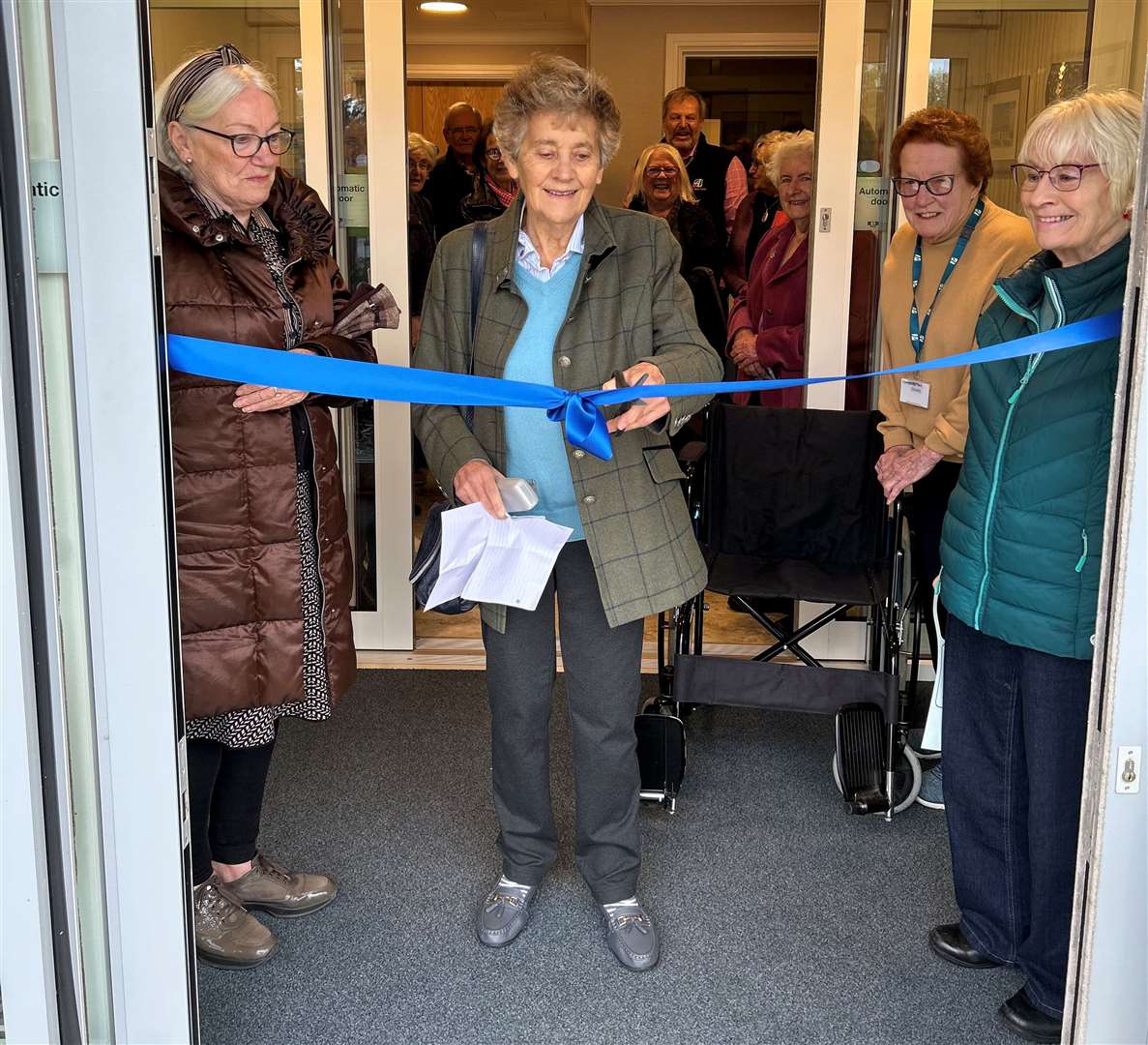 One of the founding members of Rutland Healthcare Support Susan Allen cuts the ribbon at the new location in Oakham Grange