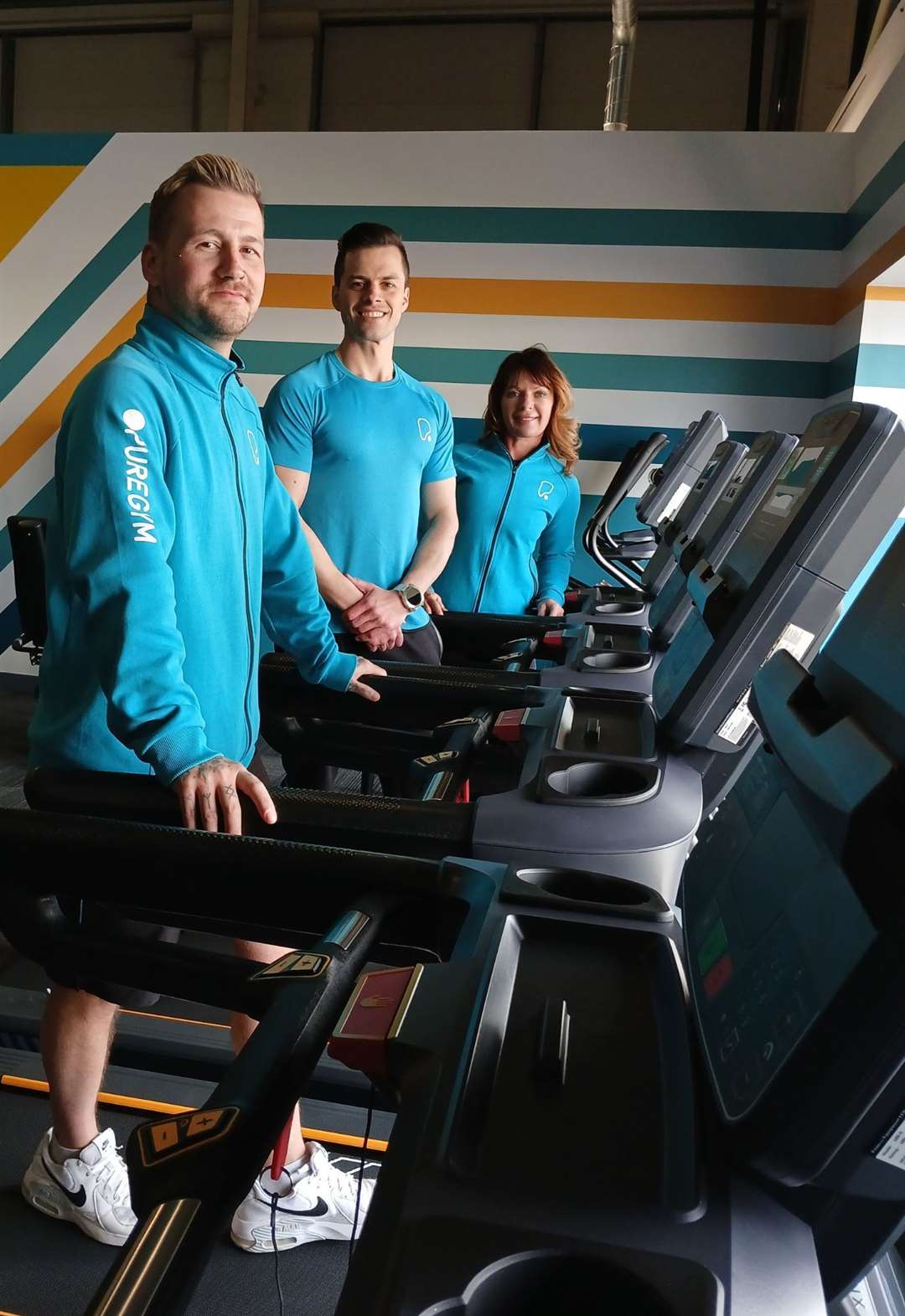 Gym managers Rob Hope, Billy Lee and Isla Oliver on the treadmills
