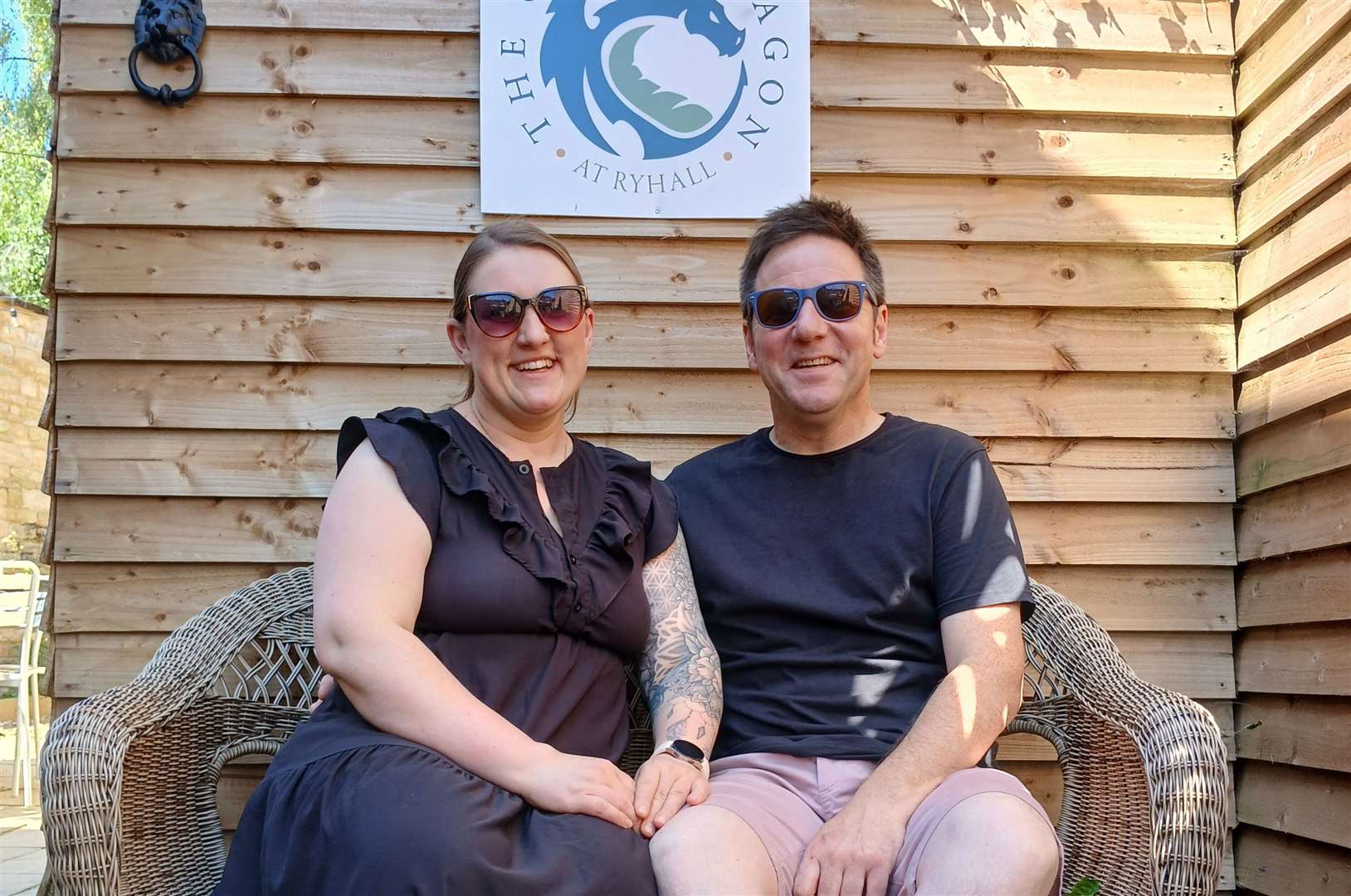 Ania and Simon Lambert relax in the courtyard outside The Green Dragon