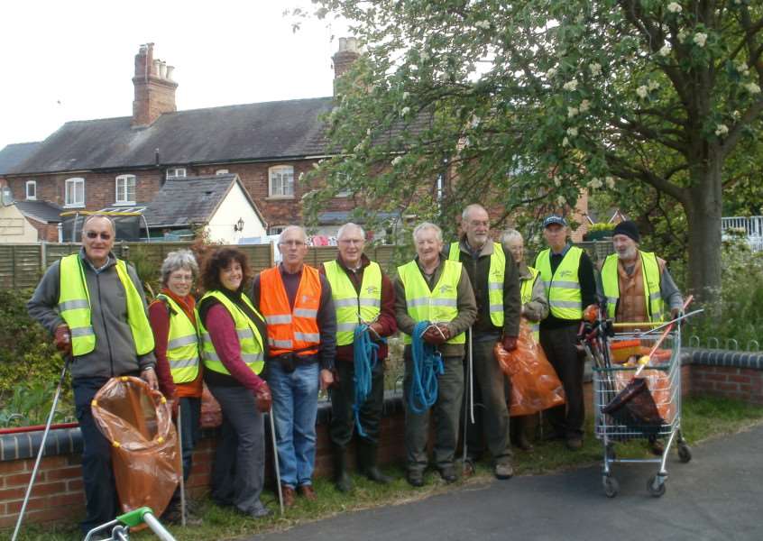 Members of Grantham Rivercare with some of the items and rubbish collected from the Witham.