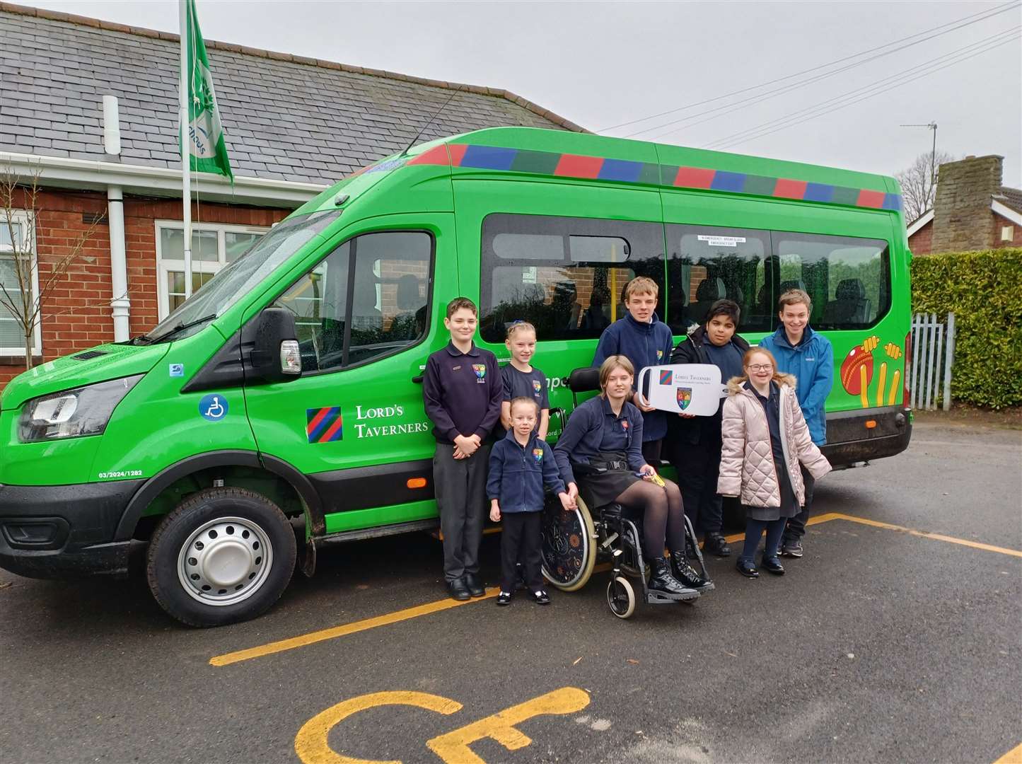 Pupils at the Grantham Additional needs Fellowship with the new minibus. | Photo: Daniel Jaines