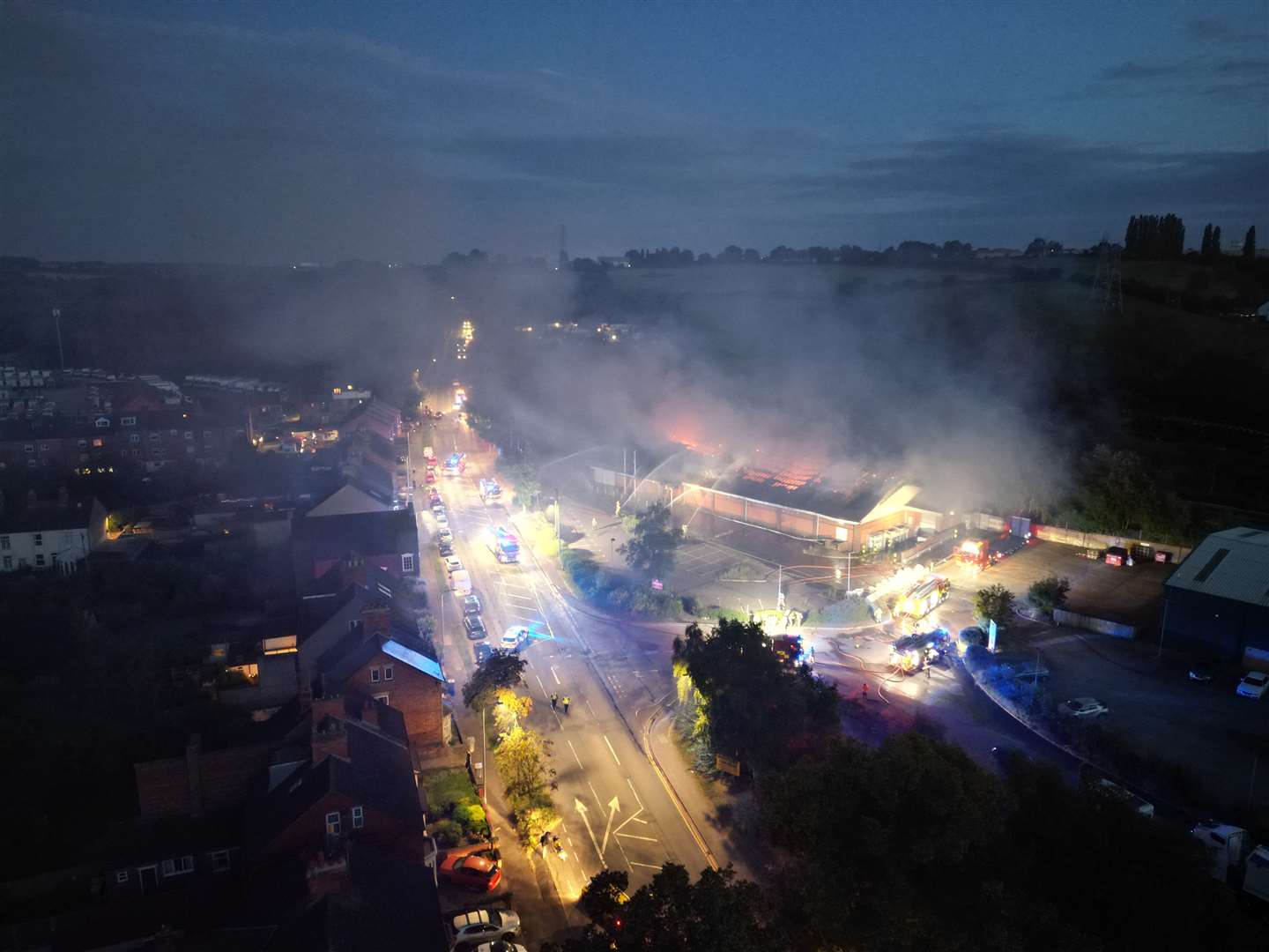 Drone photos show the extent of the fire at the former Aldi store. | Photo: Jake Harris