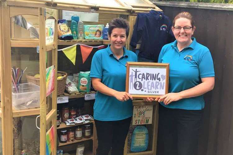 Laura Spillett and Stephanie Barrett from BeBright Nursery with their Lincolnshire County Council Silver Caring 2 Learn Award in 2021.
