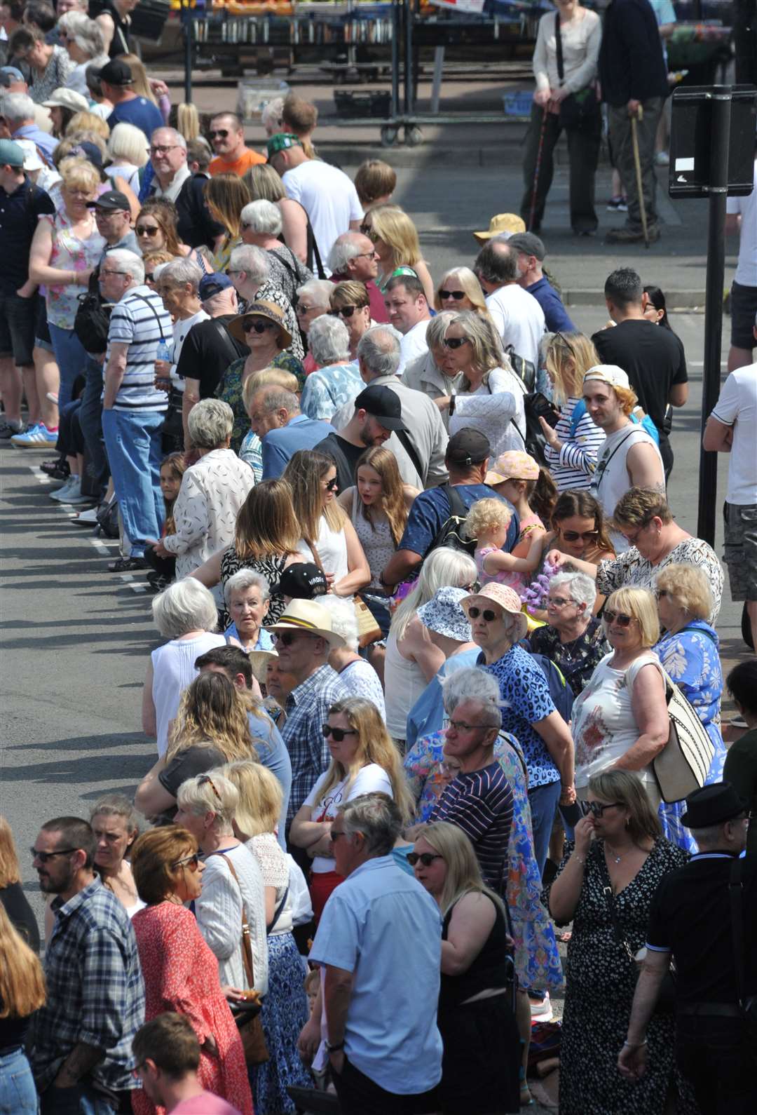 People gather in the town centre to await for Spalding Flower Parade