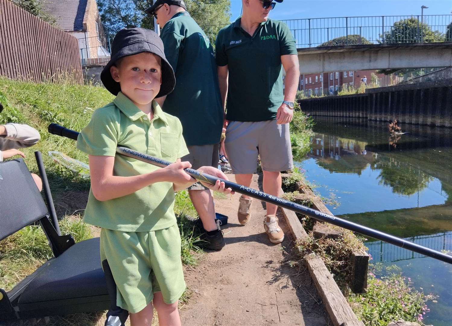 A youngster has a go fishing