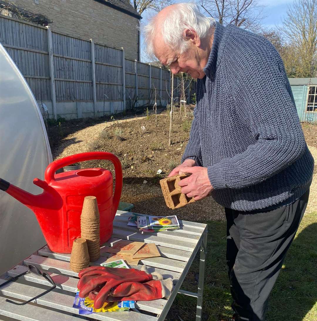 Garden volunteer Brian gets ready for Seed Swap