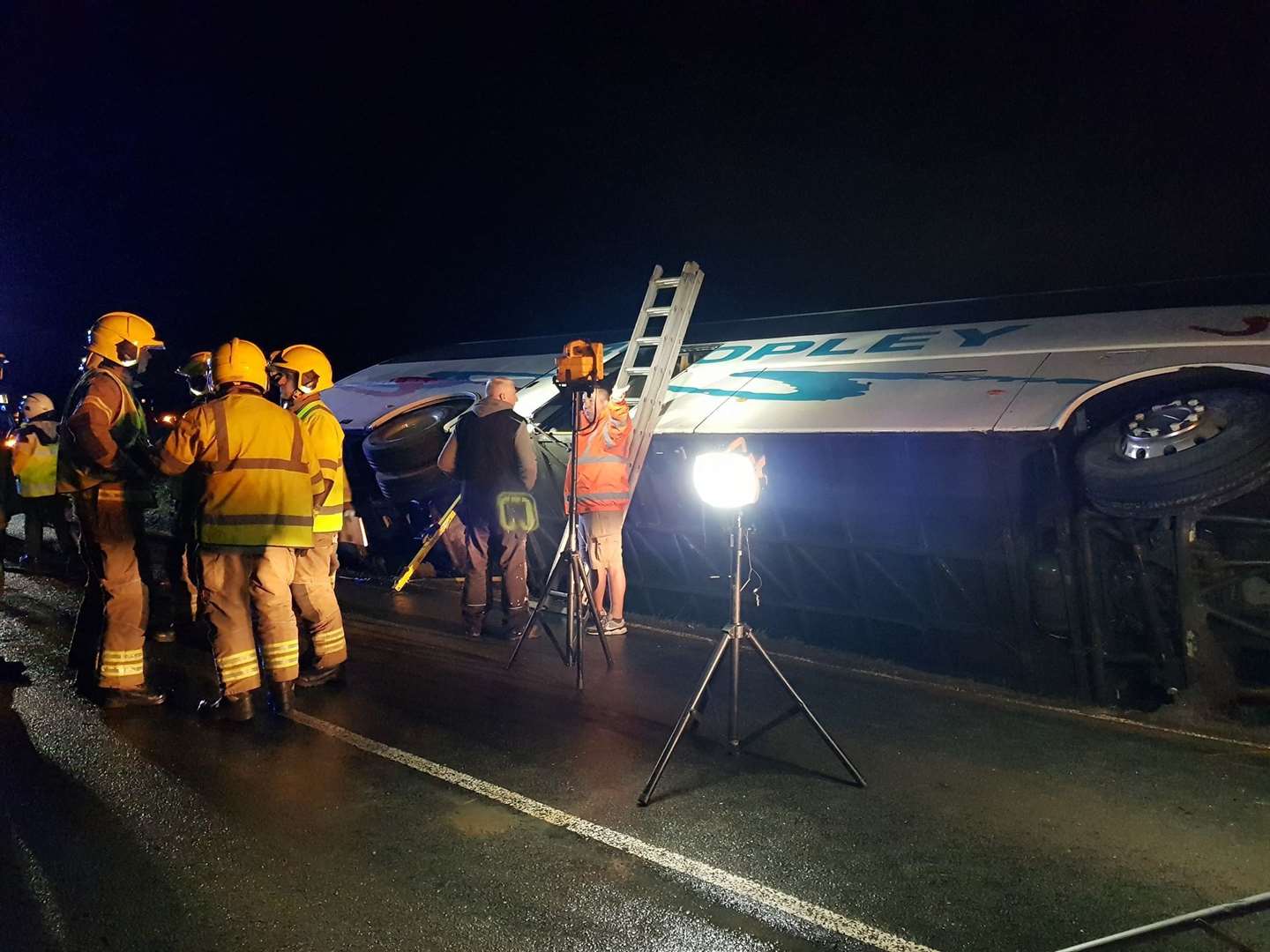 Firefighters at the scene of the accident. (23834415)