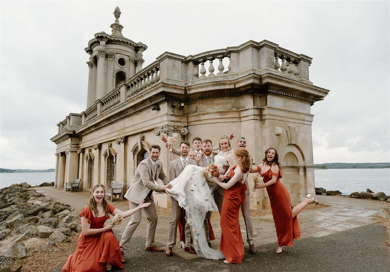 Rachel Drapper and James Dinsdale joined by their bridal party outside Normanton Church. Photo: Gina Fernandes Photography