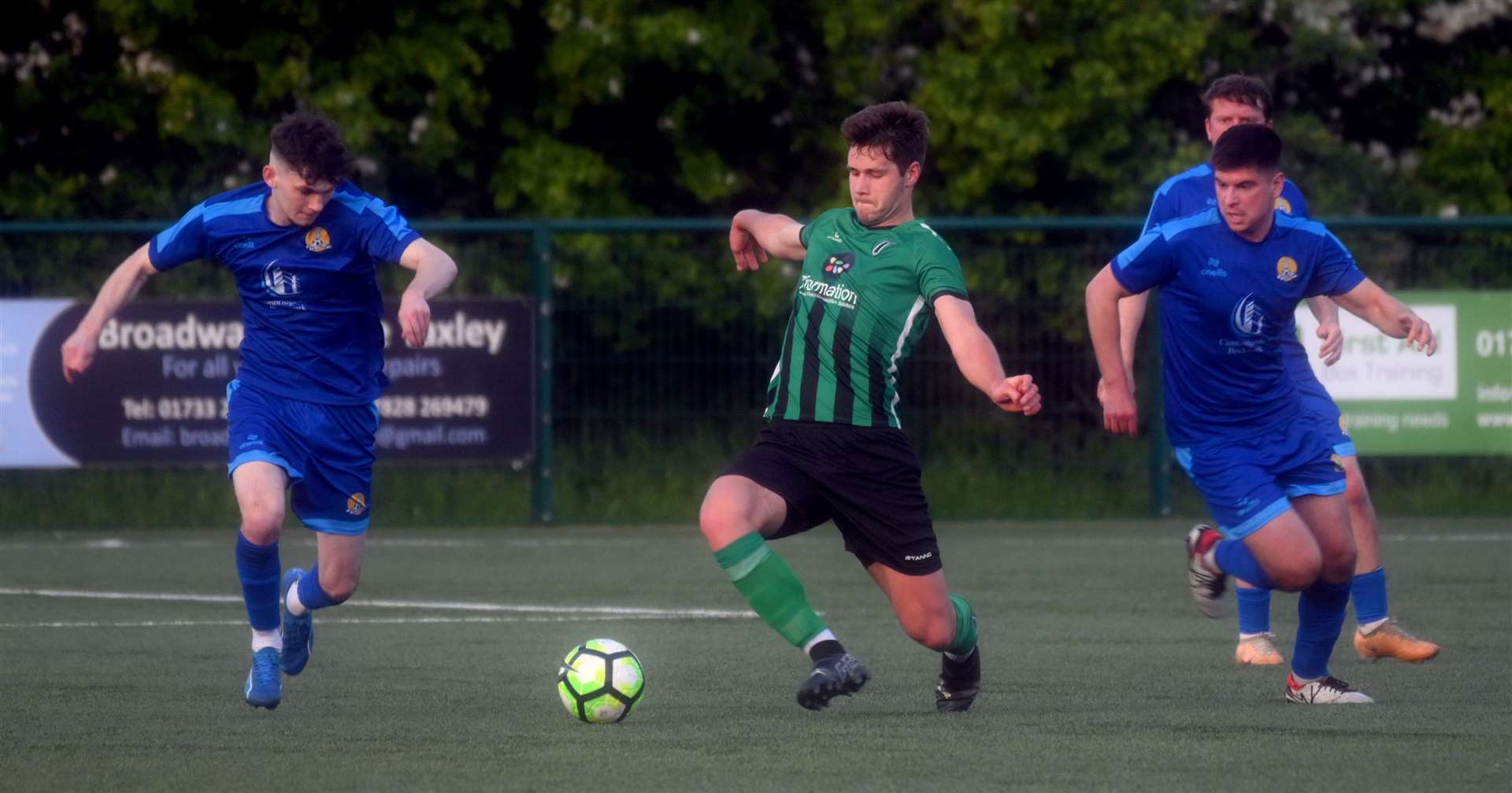 March (Blue) v Blackstones (Green and Black) in the final of the Hinchingbrooke Cup