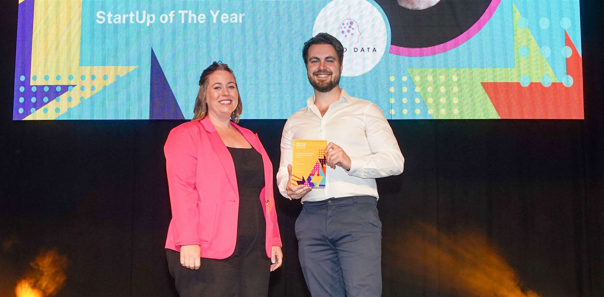 Sean Ruane receives the MedTech and HealthTech Startup of the Year award at the East of England finals of the StartUp Awards in 2023
