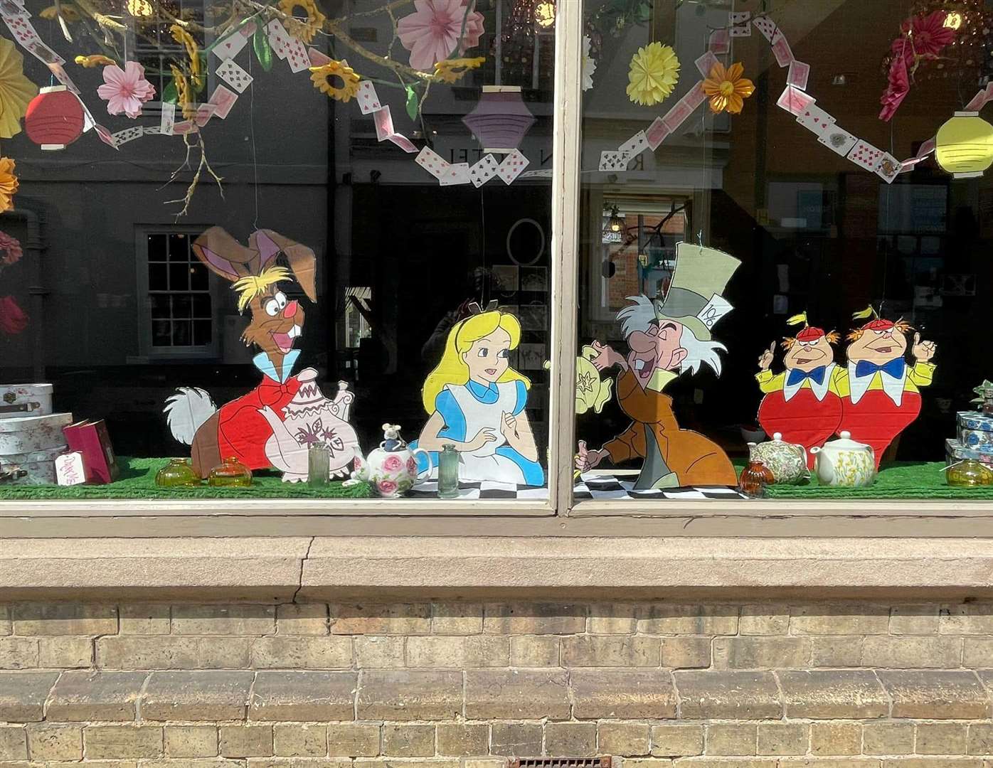 Penningtons delighted passers by with their Alice In Wonderland display as part of the Spalding Flower Parade competition