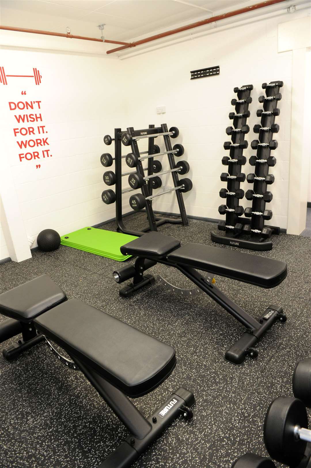 Weights and benches at the new gym (54354338)
