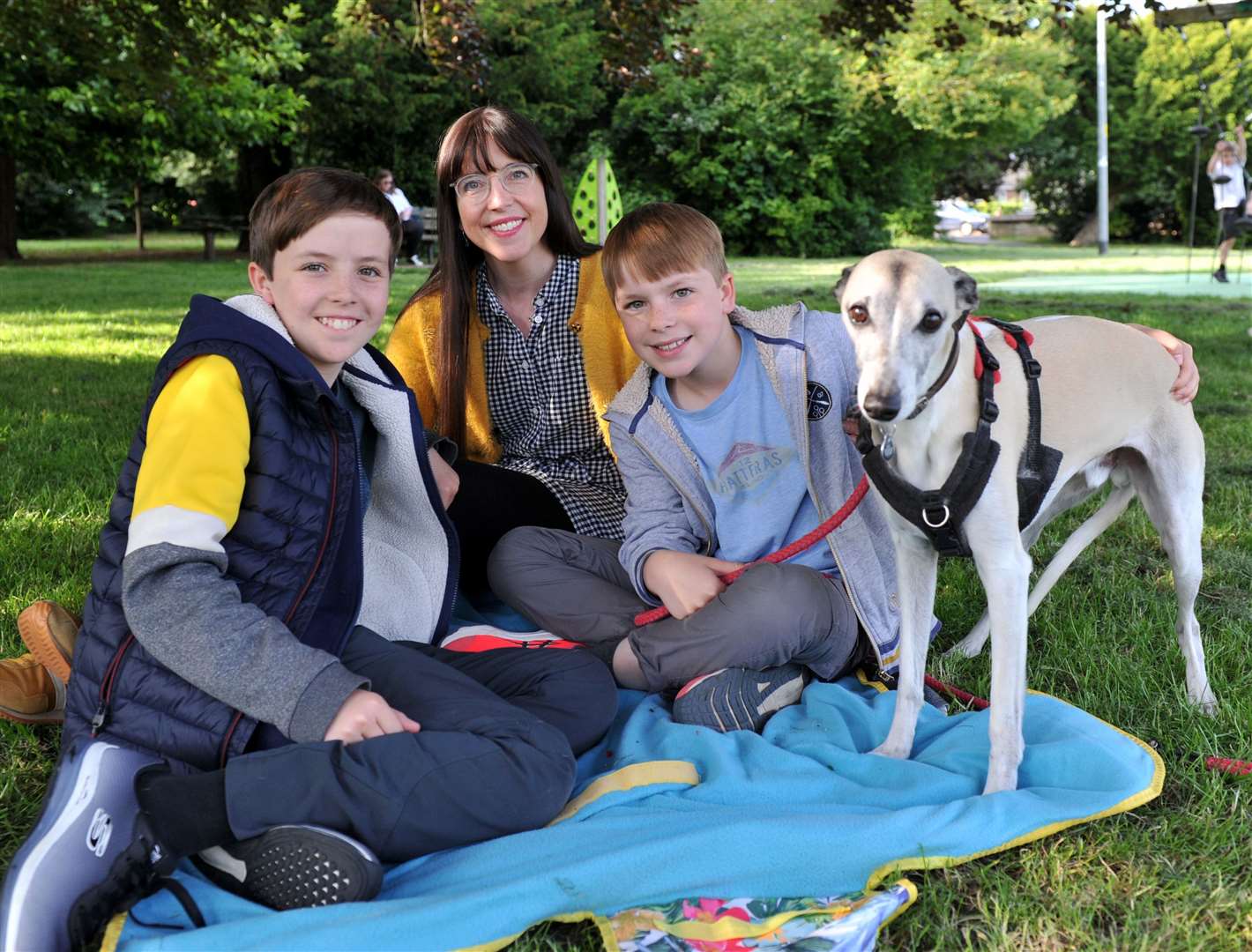 Doogie, Heather and Hamish Shorrock with their dog, Denbie. Photo: Chris Lowndes