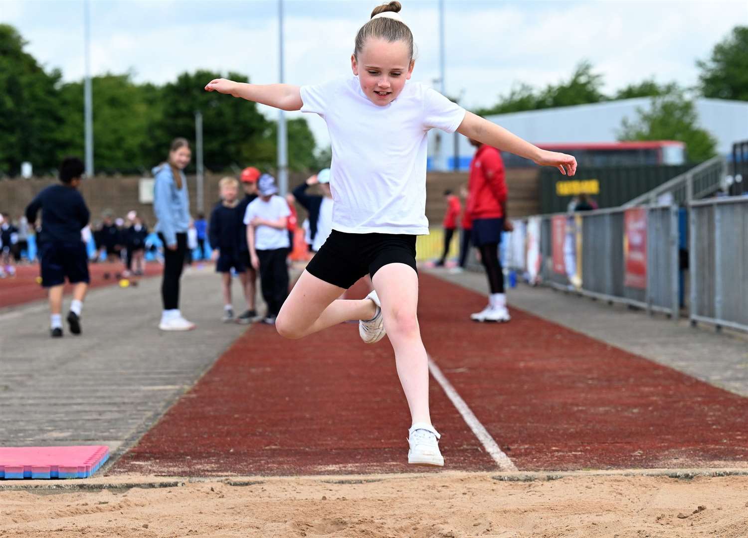 This girl attempts her best long jump!