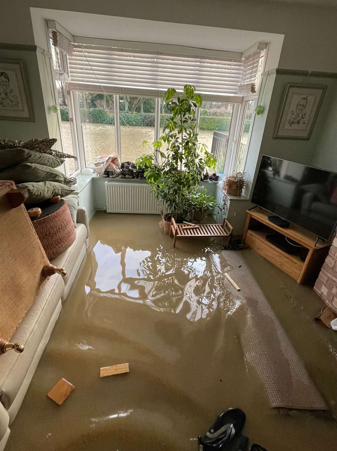Flooding in Joanna and Terry Hagues' home.
