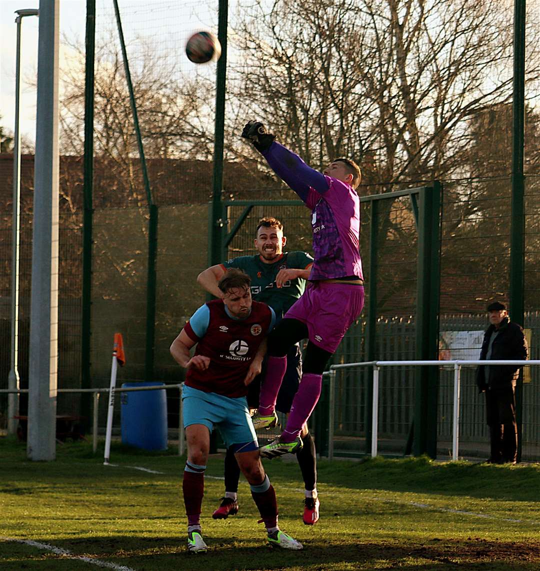Leading goal scorer Liam Moran challenges the Deeping keeper. Images: Rob Currell.