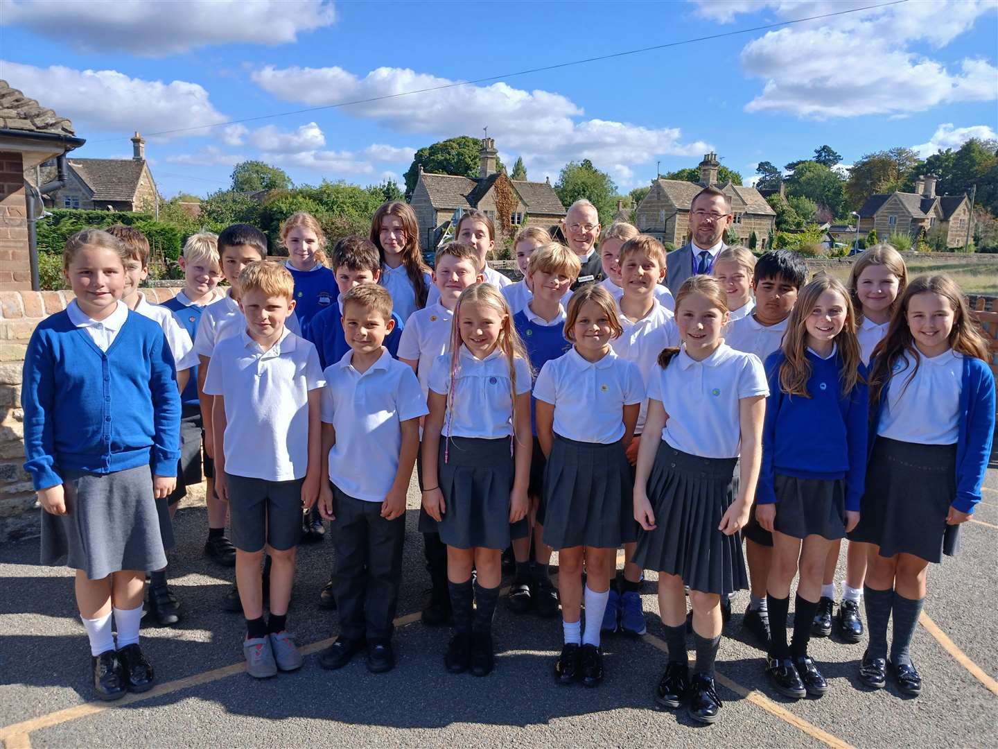 Fr Aran Beesley and Andrew Evans with Year 5/6 pupils at Uffington CE Primary School