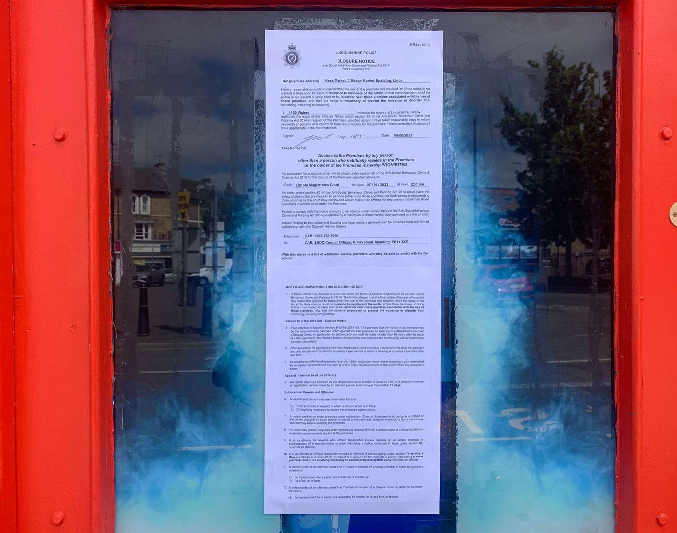 The sign in the window of the shop