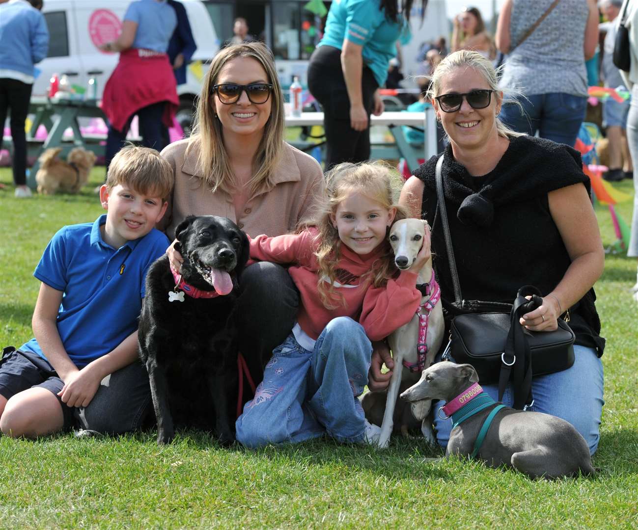 Albert, Jess and Lottie Williams and Lucy Honey with their dogs. Photo: Chris Lowndes