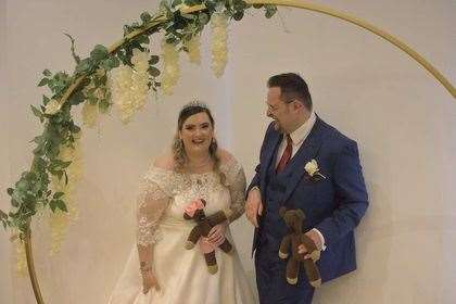 Lewis and Sarah with their Mr Bean teddies on their wedding day. (57231578)