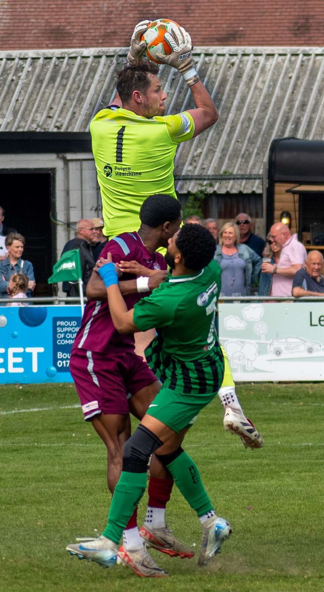 Goalkeeper Dan Swan claims a cross. Photo: Millie Deakin