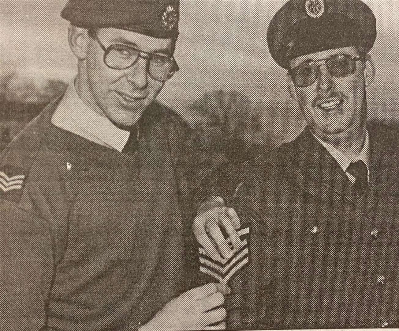 Sergeant Sean Keates (left) helps his brother Les sew on his sergeant's stripes 25 years ago.