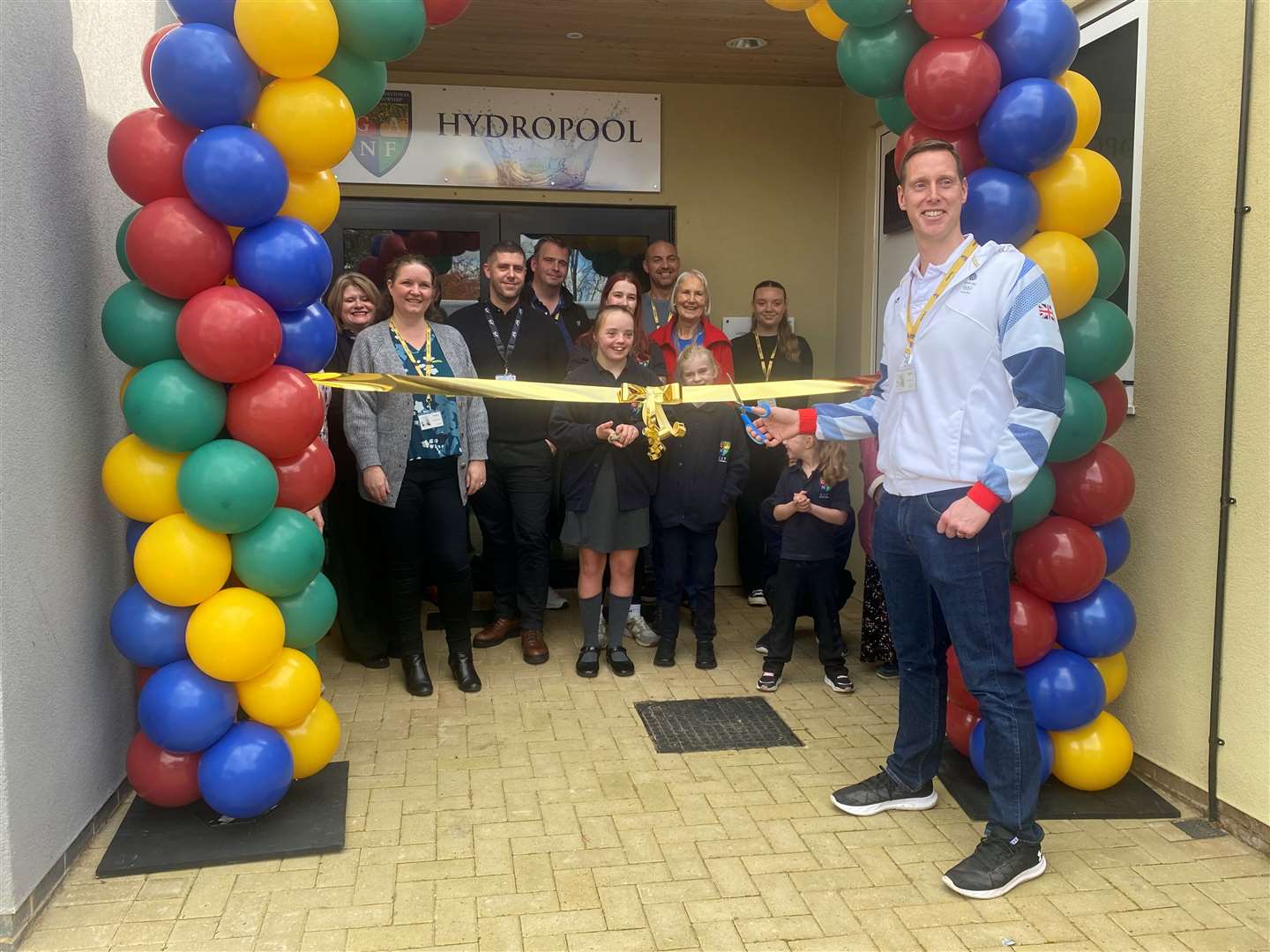 Olympic swimmer Joe Roebuck officially opened the pool.