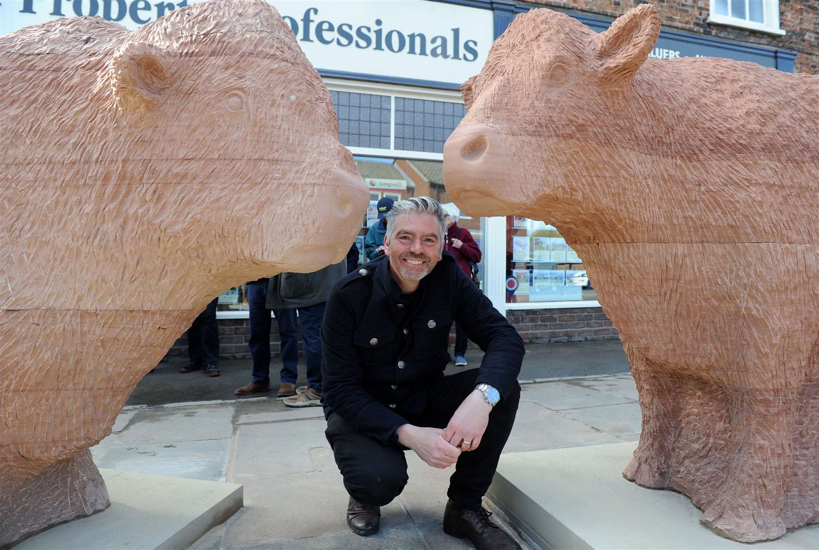The red cattle statues on New Road