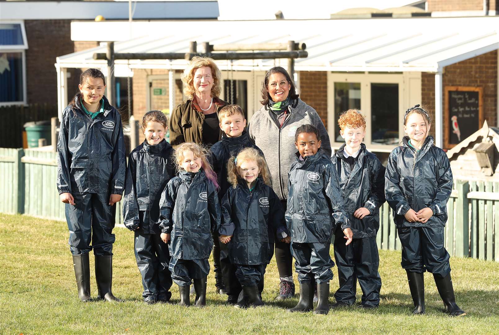 Gina Bradbury Fox, Lord Lieutenant of Rutland Dr Sarah Furness and children from Edith Weston Primary School Waterproof and Wellies Project. Photo: Glen Minikin
